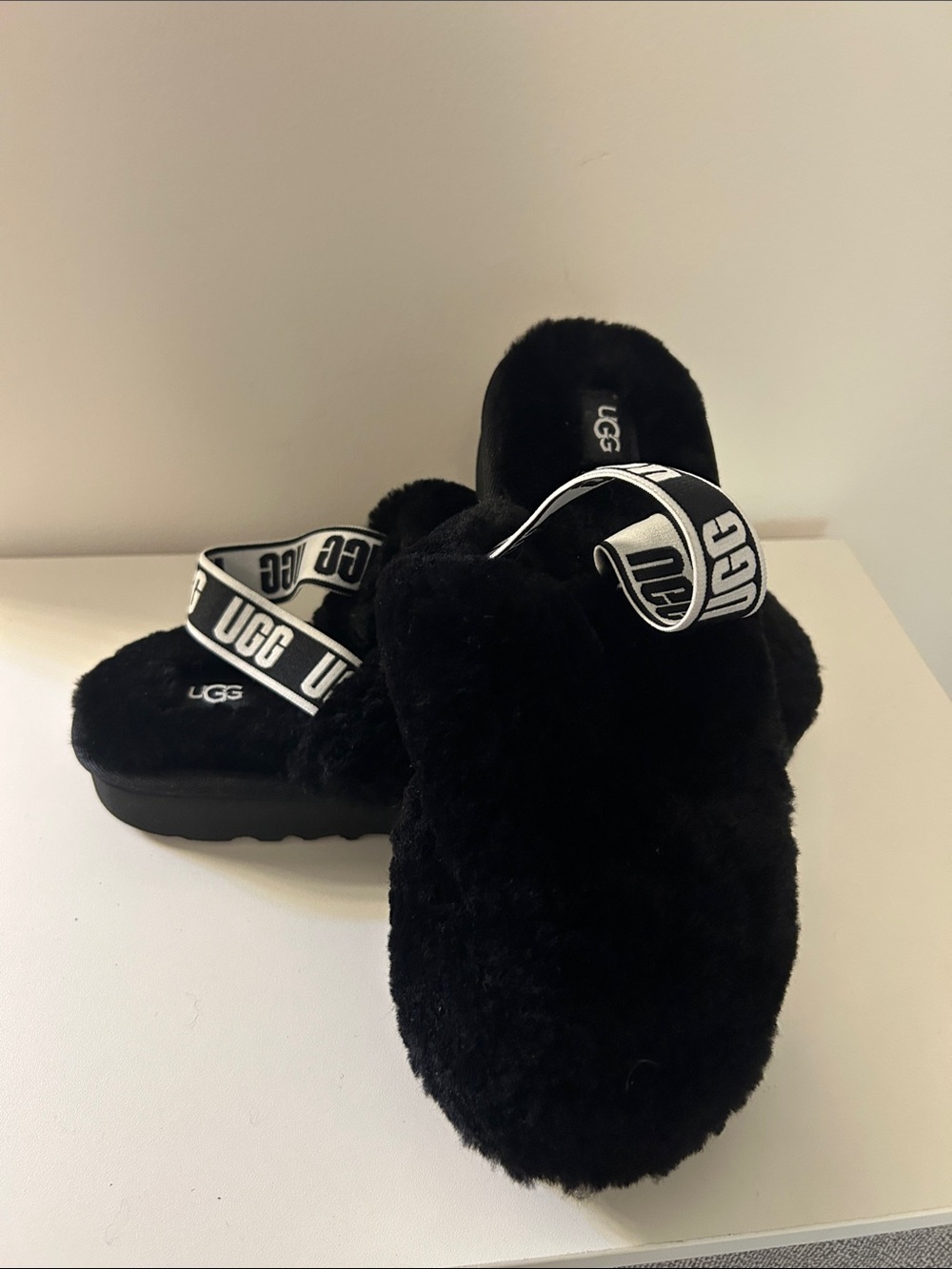 UGG Kids Black Fuzzy Slide with Branded White Strap